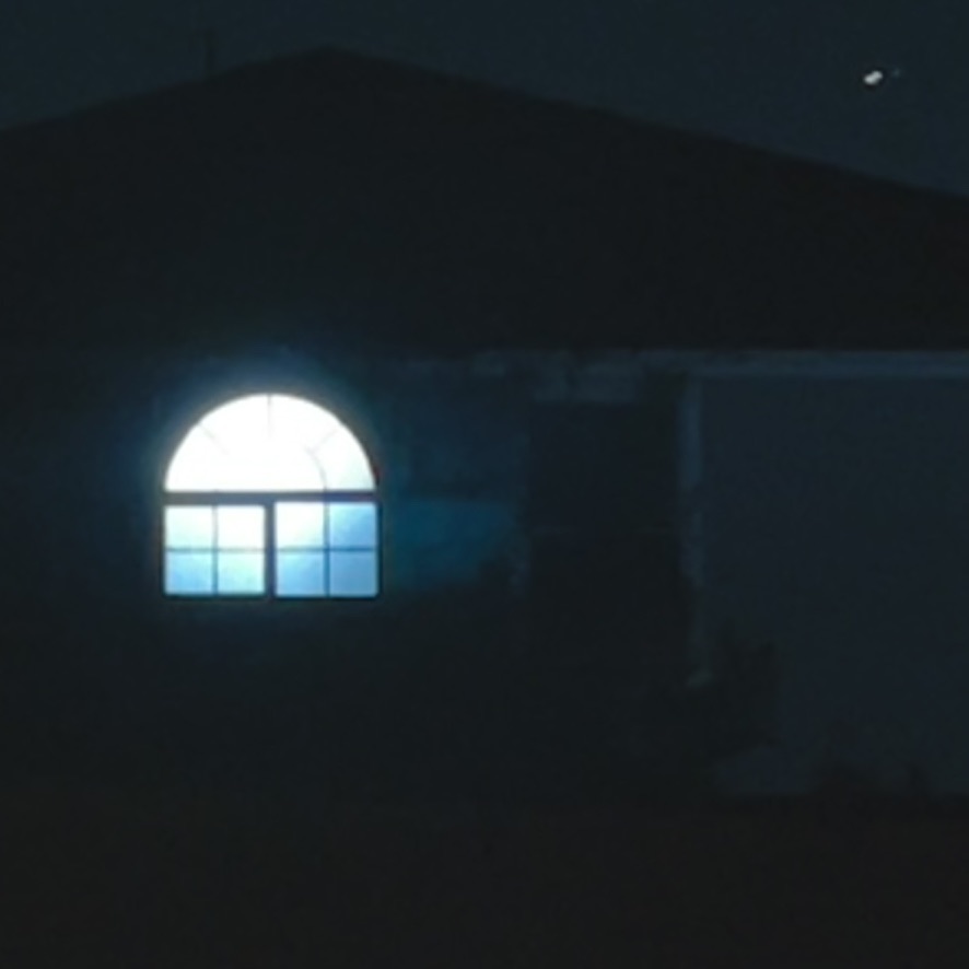 Lit window at night